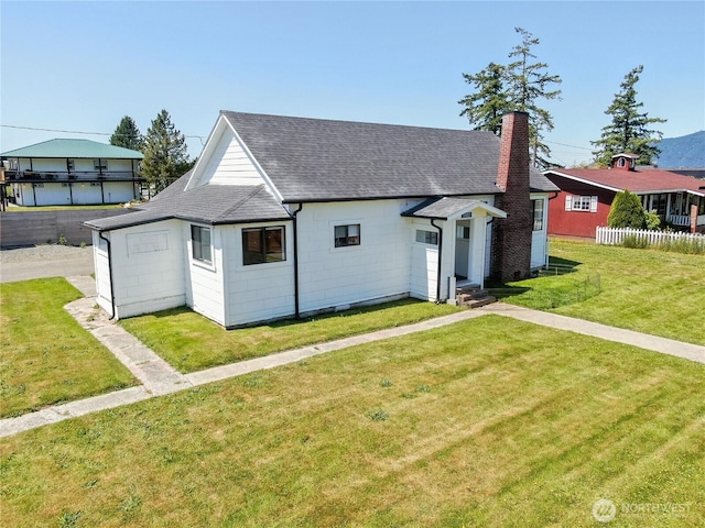 5502 Chuckanut Dr, Bow, WA 98232 - view of front of house featuring roof with shingles, a chimney, and entry steps