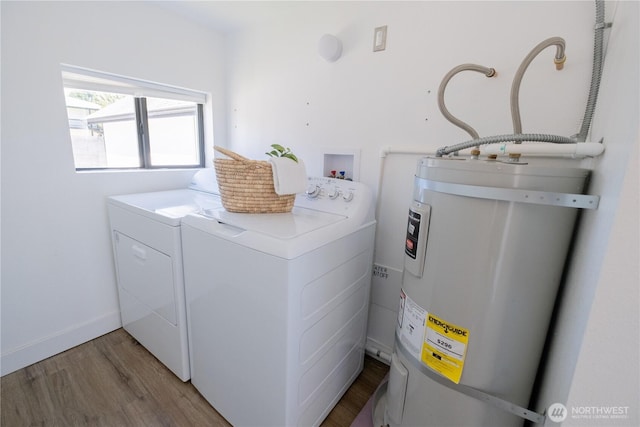 5502 Chuckanut Dr, Bow, WA 98232 - laundry room with electric water heater, washing machine and clothes dryer, and wood finished floors