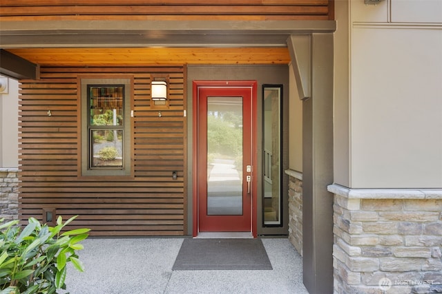587 155th Pl NE, Bellevue, WA 98007 - property entrance featuring stone siding