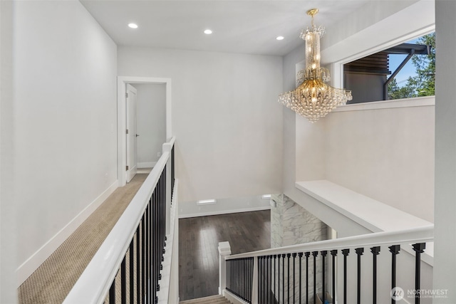 587 155th Pl NE, Bellevue, WA 98007 - hallway featuring a chandelier, recessed lighting, wood finished floors, and an upstairs landing