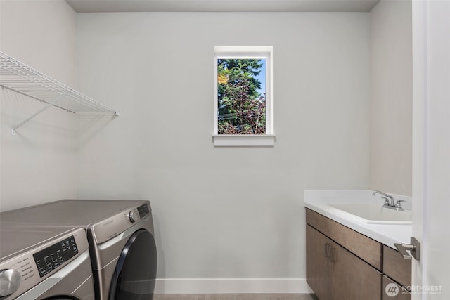 587 155th Pl NE, Bellevue, WA 98007 - laundry area with washing machine and dryer and cabinet space