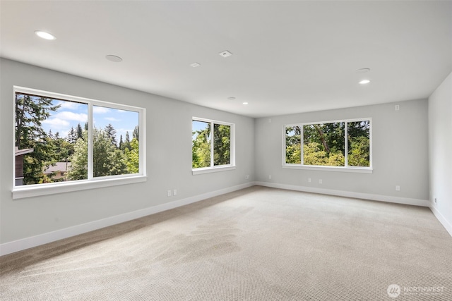 587 155th Pl NE, Bellevue, WA 98007 - empty room featuring recessed lighting and light colored carpet