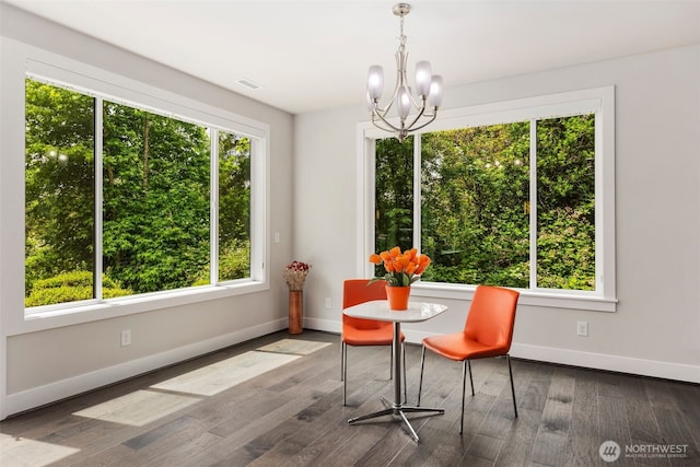 587 155th Pl NE, Bellevue, WA 98007 - dining room with a chandelier and wood finished floors