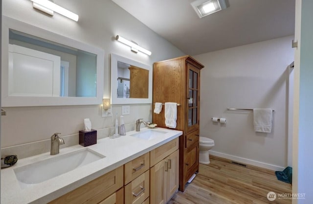 999 41st Ln, Seaview, WA 98644 - bathroom with double vanity and wood finished floors