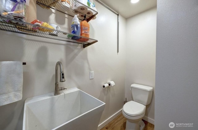 999 41st Ln, Seaview, WA 98644 - bathroom featuring wood finished floors and recessed lighting