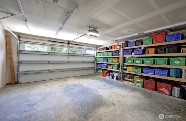 999 41st Ln, Seaview, WA 98644 - garage featuring a garage door opener