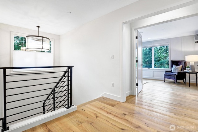 11216 NE 67th St Unit 4, Kirkland, WA 98033 - hall featuring an upstairs landing and hardwood / wood-style floors