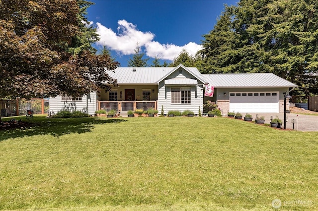 1043 NE Pennington Loop, Coupeville, WA 98239 - single story home with an attached garage, a front lawn, driveway, and a metal roof