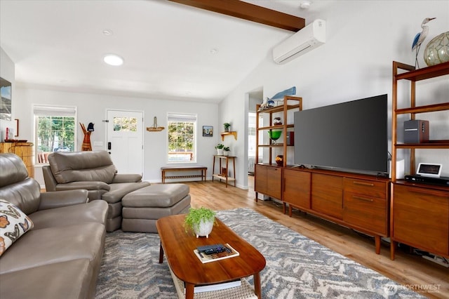 1043 NE Pennington Loop, Coupeville, WA 98239 - living area featuring a wall unit AC and wood finished floors