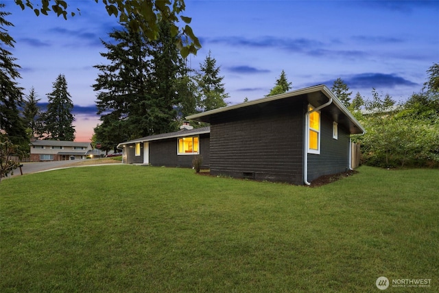 10403 Wauna St SW, Lakewood, WA 98498 - view of property exterior with a lawn
