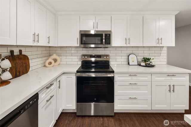 10403 Wauna St SW, Lakewood, WA 98498 - kitchen featuring appliances with stainless steel finishes, white cabinets, light countertops, and backsplash