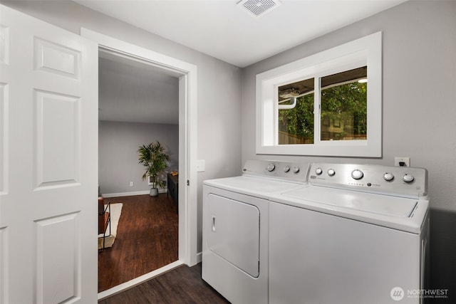 10403 Wauna St SW, Lakewood, WA 98498 - washroom with washing machine and clothes dryer and dark wood-style floors