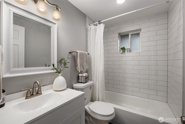 10403 Wauna St SW, Lakewood, WA 98498 - full bathroom featuring vanity and shower / bath combination with curtain
