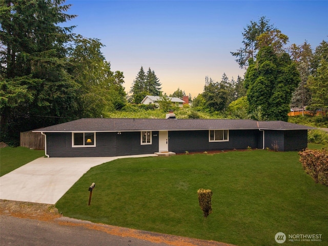 10403 Wauna St SW, Lakewood, WA 98498 - ranch-style home featuring a front yard, a chimney, and driveway