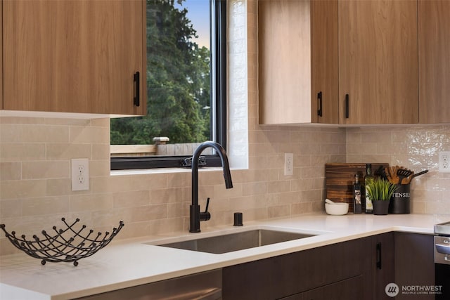 2912 SW Thistle St Unit B, Seattle, WA 98126 - kitchen with light countertops and decorative backsplash