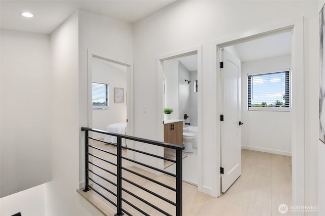 2912 SW Thistle St Unit B, Seattle, WA 98126 - hallway featuring plenty of natural light and recessed lighting