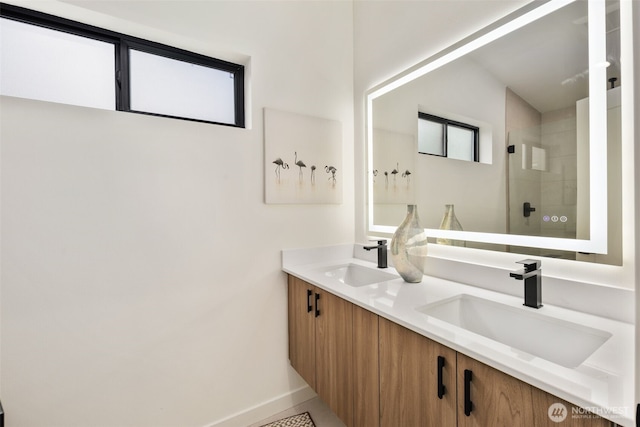 2912 SW Thistle St Unit B, Seattle, WA 98126 - full bathroom with double vanity and a tile shower