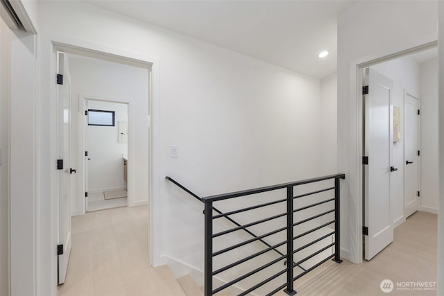 2912 SW Thistle St Unit B, Seattle, WA 98126 - hallway featuring an upstairs landing and recessed lighting