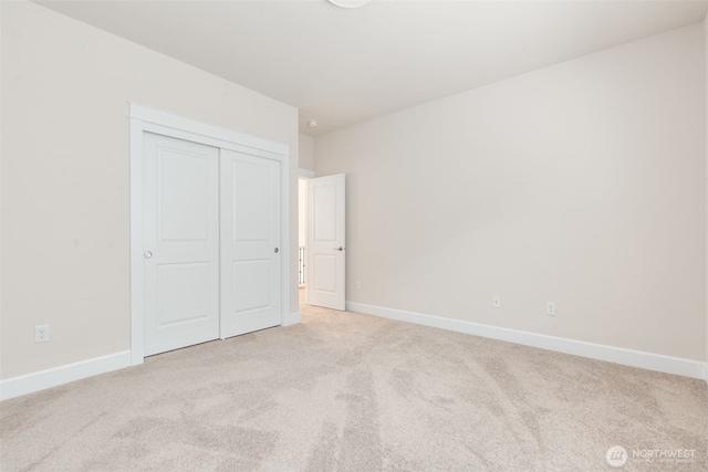 1297 Westridge Way NE, Issaquah, WA 98029 - unfurnished bedroom with light carpet and a closet