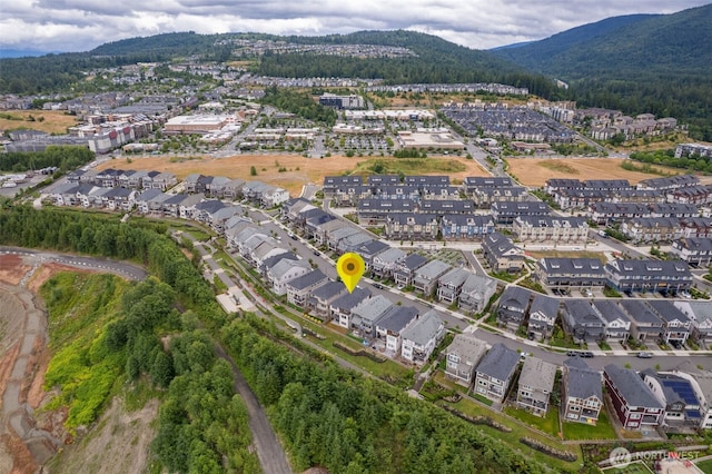 1297 Westridge Way NE, Issaquah, WA 98029 - aerial overview of property's location featuring a mountain backdrop and nearby suburban area