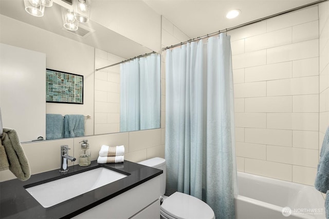 3019 62nd Ave SW Unit D, Seattle, WA 98116 - full bathroom with vanity, shower / tub combo, and recessed lighting