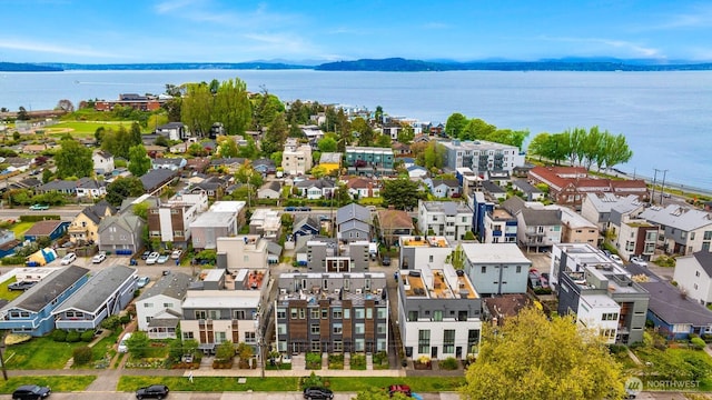 3019 62nd Ave SW Unit D, Seattle, WA 98116 - drone / aerial view of a water and mountain view