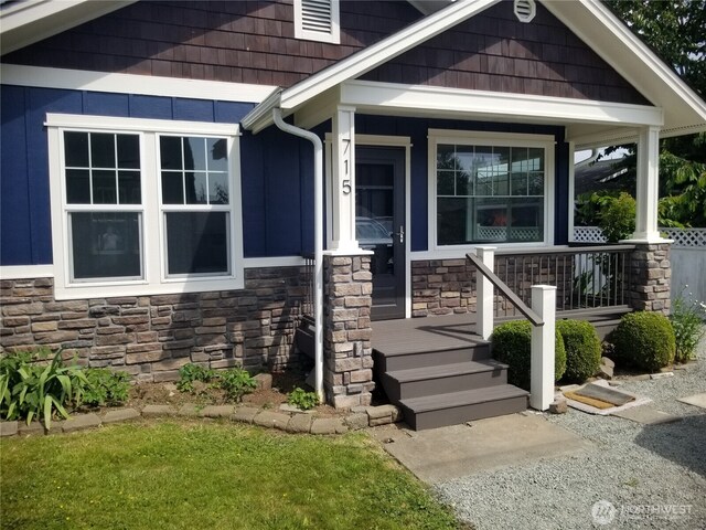 715 Ford Ave, Snohomish, WA 98290 - view of front of home featuring stone siding and a porch