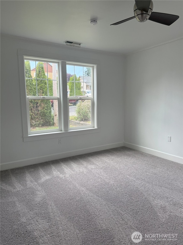 715 Ford Ave, Snohomish, WA 98290 - carpeted empty room featuring crown molding, a smoke detector, plenty of natural light, and ceiling fan