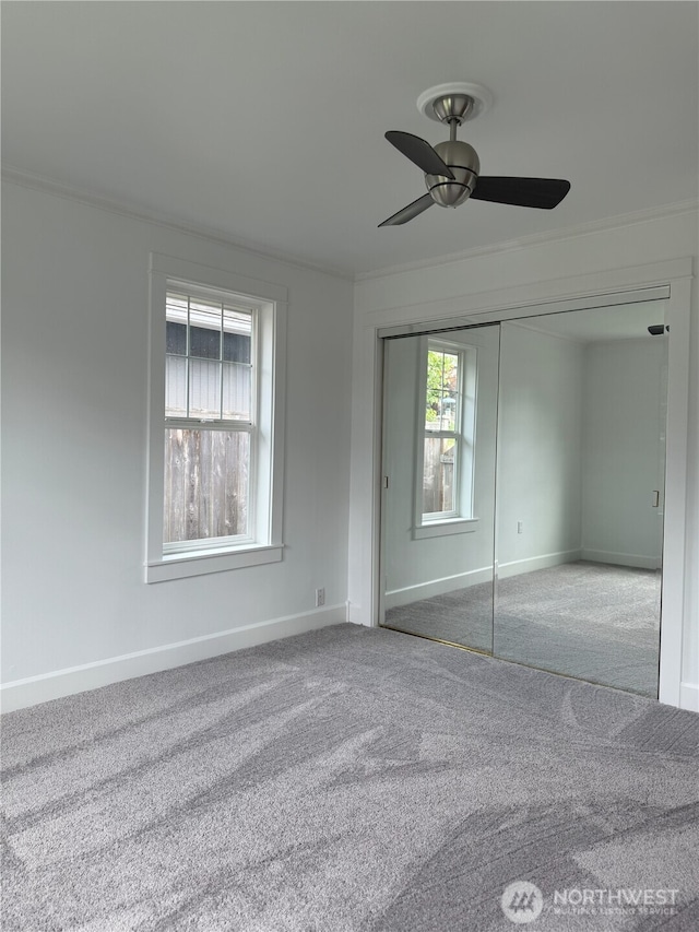 715 Ford Ave, Snohomish, WA 98290 - unfurnished bedroom featuring carpet, a closet, ornamental molding, and ceiling fan