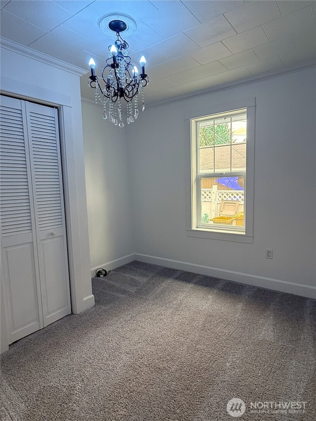 715 Ford Ave, Snohomish, WA 98290 - unfurnished room with crown molding, a chandelier, and carpet floors