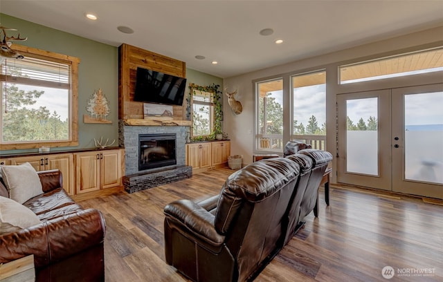108 Hummingbird Rd, East Wenatchee, WA 98802 - living room featuring french doors, healthy amount of natural light, wood finished floors, and recessed lighting