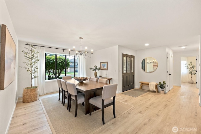 9019 166th St E, Puyallup, WA 98375 - dining area featuring a chandelier, light wood-type flooring, and recessed lighting
