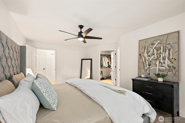 9019 166th St E, Puyallup, WA 98375 - bedroom with a spacious closet, a ceiling fan, and a closet