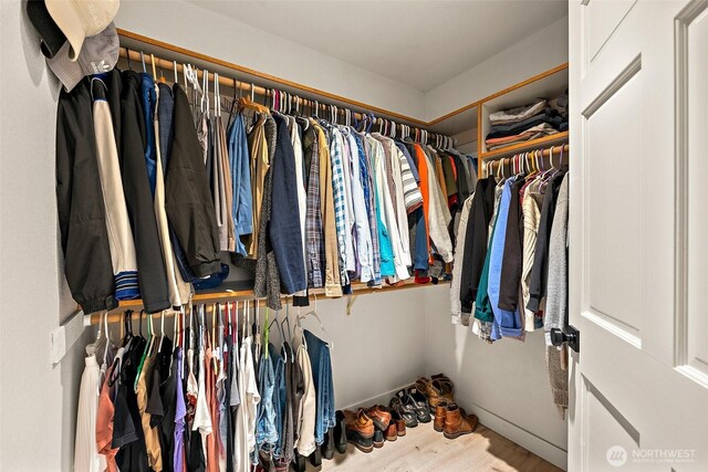 9019 166th St E, Puyallup, WA 98375 - spacious closet featuring wood finished floors