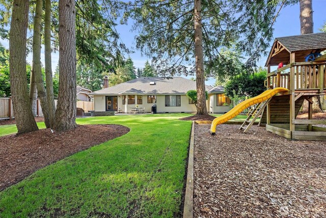 9019 166th St E, Puyallup, WA 98375 - rear view of property with a playground