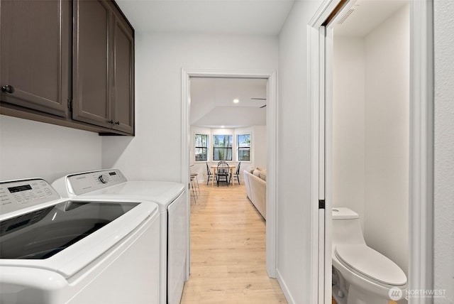 9019 166th St E, Puyallup, WA 98375 - laundry area with separate washer and dryer, light wood finished floors, cabinet space, and recessed lighting