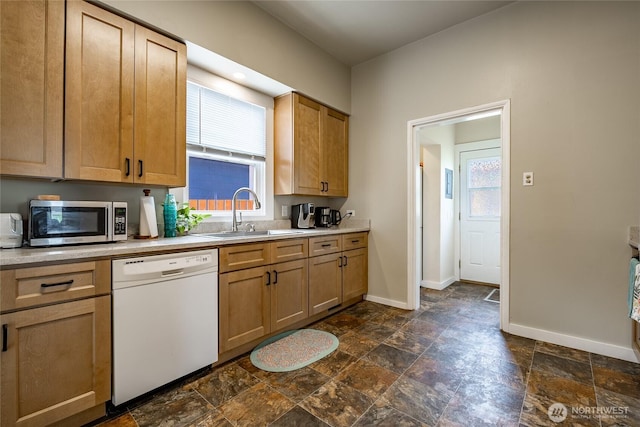 1639 King St, Bellingham, WA 98225 - kitchen with dishwasher, stainless steel microwave, dark stone finish floors, and light countertops