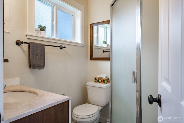 1639 King St, Bellingham, WA 98225 - bathroom featuring vanity and a shower with door