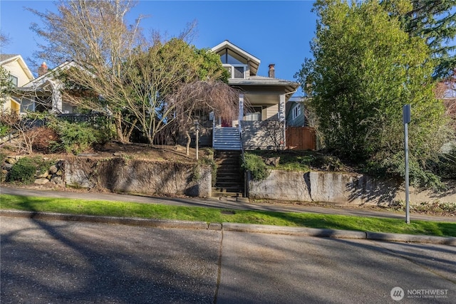6306 17th Ave NE, Seattle, WA 98115 - view of property hidden behind natural elements with stairway