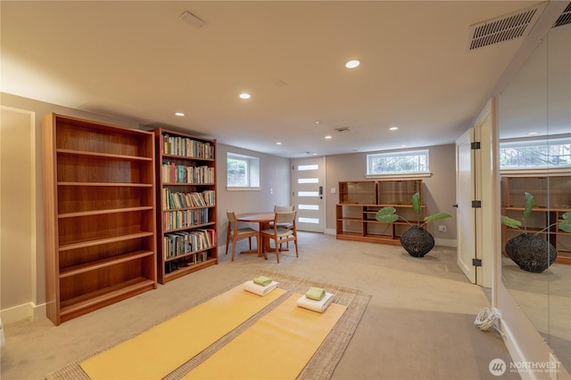 6306 17th Ave NE, Seattle, WA 98115 - living area featuring light colored carpet, recessed lighting, and healthy amount of natural light