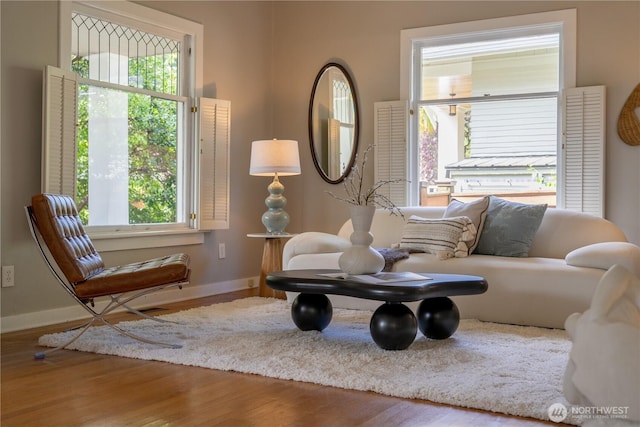 6306 17th Ave NE, Seattle, WA 98115 - living room featuring plenty of natural light and wood finished floors