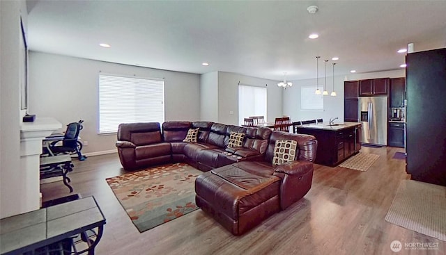 4218 SW Colbert Way, Port Orchard, WA 98367 - living room with wood finished floors, recessed lighting, and a chandelier