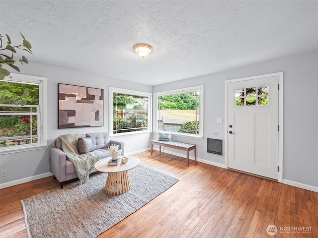9420 S Sheridan Ave, Tacoma, WA 98444 - living area with wood-type flooring and a textured ceiling