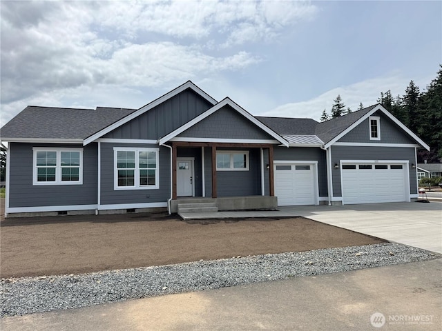 122 Sable Dr, Everson, WA 98247 - view of front of property featuring a garage, driveway, board and batten siding, and a shingled roof