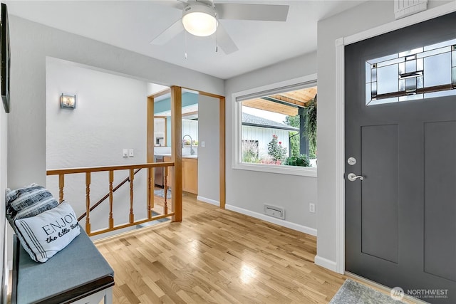 1317 23rd Ave SW, Puyallup, WA 98371 - foyer entrance with light wood finished floors and ceiling fan