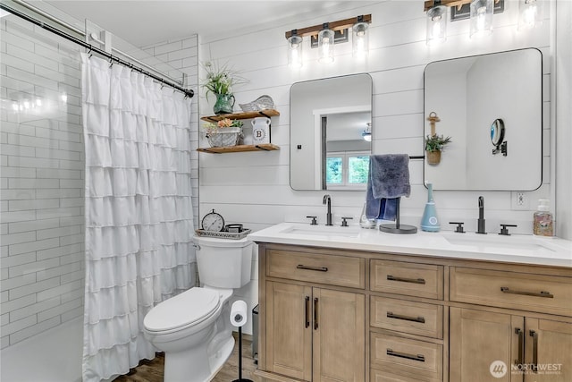 1317 23rd Ave SW, Puyallup, WA 98371 - bathroom featuring double vanity and toilet