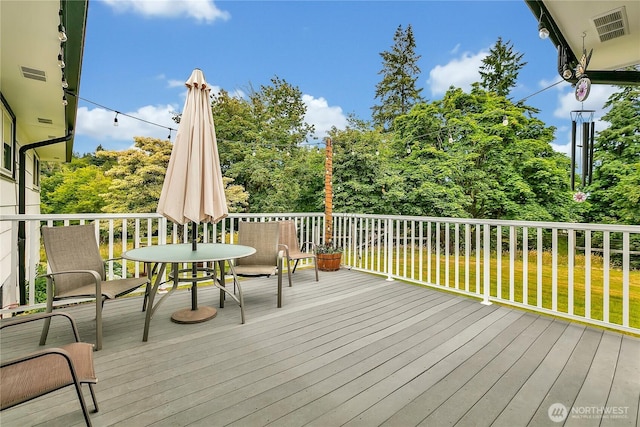 1317 23rd Ave SW, Puyallup, WA 98371 - wooden deck with view of wooded area