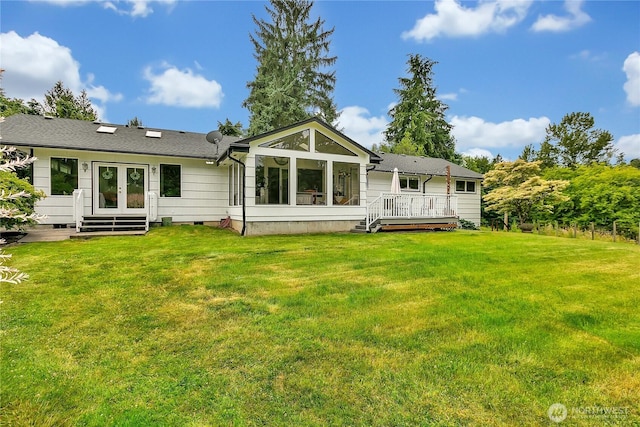 1317 23rd Ave SW, Puyallup, WA 98371 - back of house featuring french doors, a deck, a yard, crawl space, and a sunroom