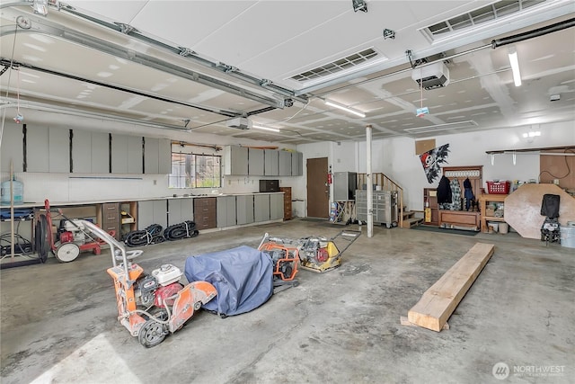 1317 23rd Ave SW, Puyallup, WA 98371 - garage with a garage door opener