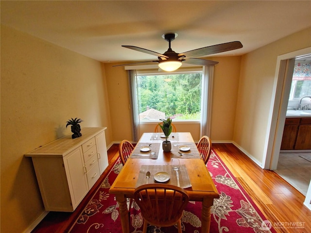 456 Upper Grand Ave, Hoquiam, WA 98550 - dining space with light wood finished floors and a ceiling fan